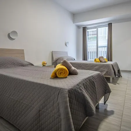 Palm Court Luxe Apartment